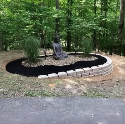 buddha serenity garden wv Landscaped garden bed with multi-tier paver retaining wall hardscaping in Fairdale, West Virginia. Zen buddha serenity garden.
